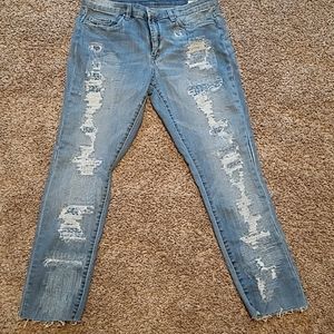 Distressed cropped skinny jeans